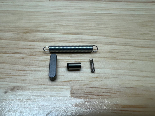 Mechanical components on a wooden surface